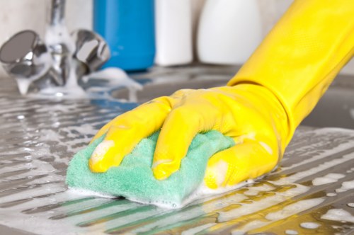 Cleaner handling waste disposal during a property deep clean